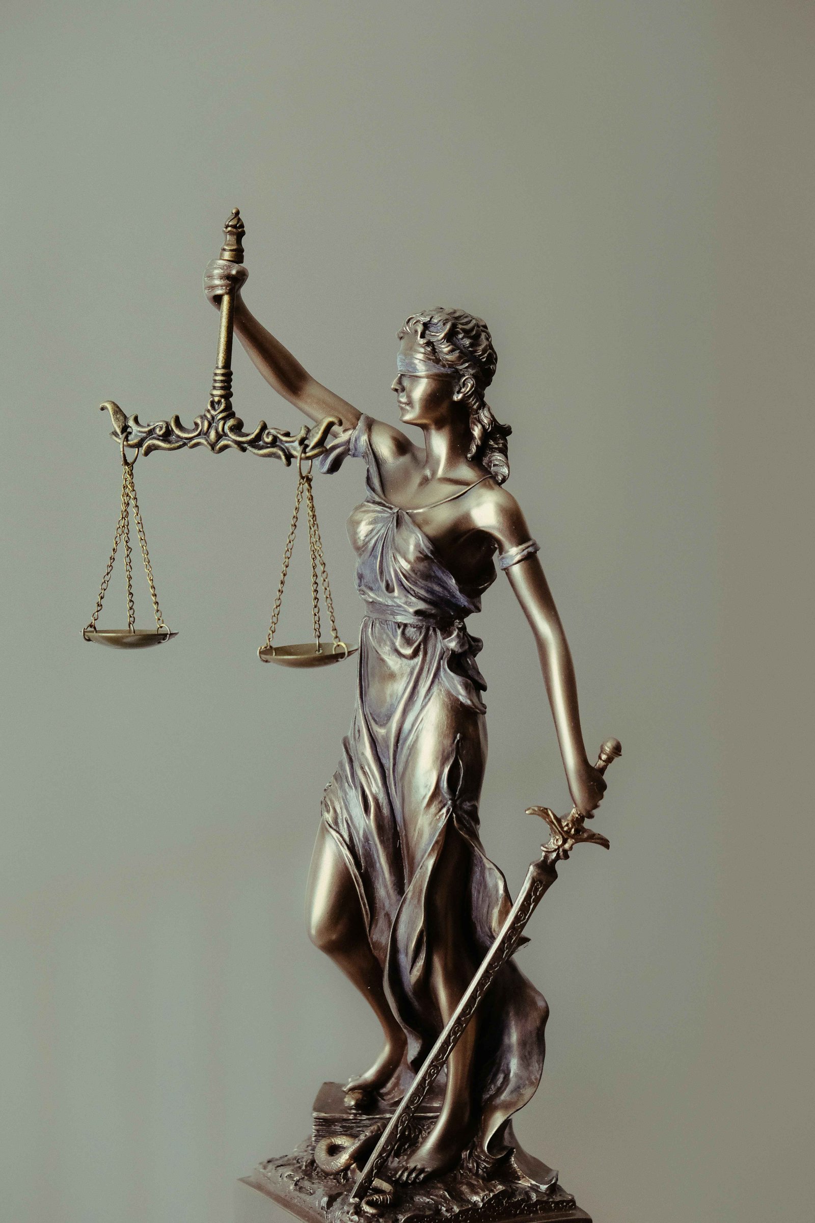 Statue of Lady Justice holding scales